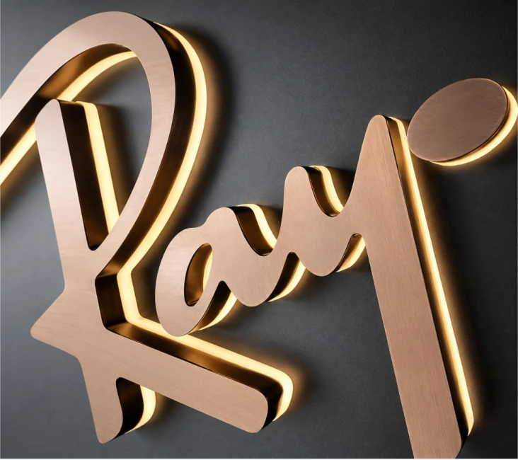 Halo-lit channel letters glowing against a dark wall.