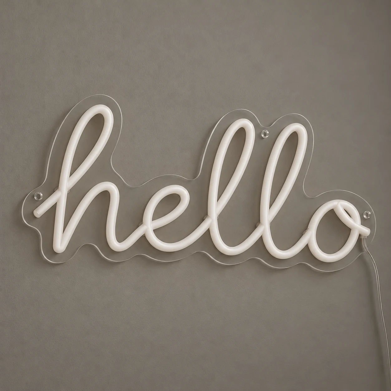 Script "hello" LED Flex Neon in white silicone tubing on one clear acrylic backing with its cable, switched off